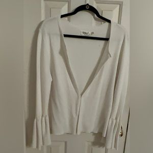 Bell sleeve cream cardigan with a secret hook and eye in the middle.